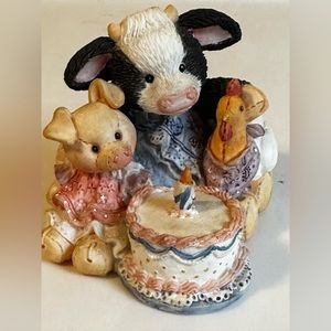 Celebratory figurine from Mary’s Moo Moos collection—“Butter Cream Wishes”